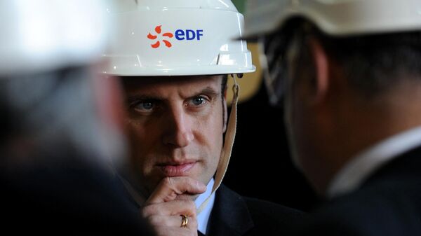 Emmanuel Macron wearing a French state-owned electric utility company EDF helmet during a visit to the Civaux nuclear power plant. File photo. - Sputnik International