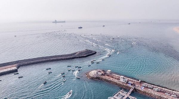 This photo provided by Iran&#x27;s Revolutionary Guard Corps (IRGC) official website via SEPAH News shows Iranian Revolutionary Guard naval vessels taking part in a military drill near the island of Abu Musa, off the coast of the southern Iranian city of Bandar Lengeh. - Sputnik International