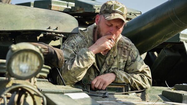 Tanker takes a break from training at a range in the Donetsk People's Republic, file photo. - Sputnik International