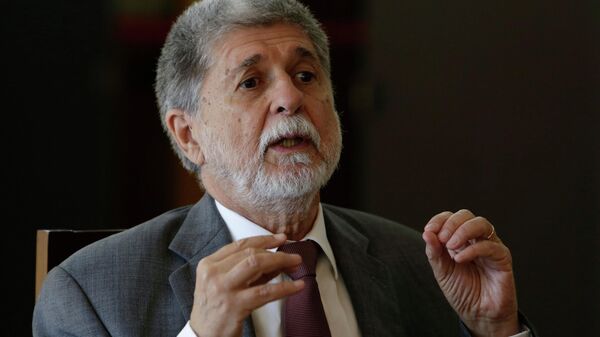 Brazil's Defense Minister Celso Amorim speaks during an interview with international journalists at the Ministry of Defense, in Brasilia, Brazil, Tuesday, March 11, 2014. Amorim said Tuesday that Brazil is ready to counter any cyber attacks that may occur during the 2014 World Cup scheduled to begin June 12. - Sputnik International