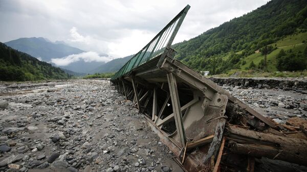 A destroyed bridge is seen after a landslide near Shovia, bout 140 kilometers (85 miles) northwest of the capital Tbilisi, Georgia, Friday, Aug. 4, 2023. At least seven people were killed and more than 30 are missing after a landslide hit a resort area in the mountains of the country of Georgia, officials and news reports said Friday.  - Sputnik International