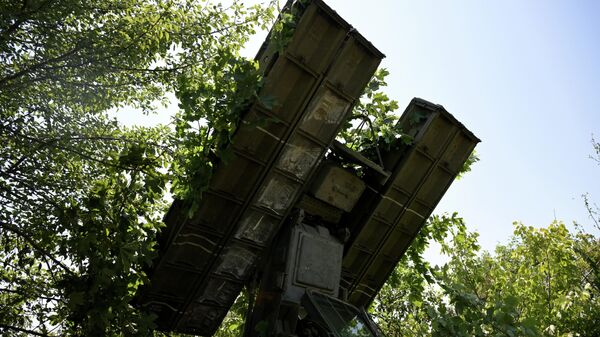 A view shows a 9K35 Strela-10 (Arrow) air defense system of the 2nd Russian Army Corps of the Southern Group of Forces at a position in the course of Russia's military operation in Ukraine - Sputnik International