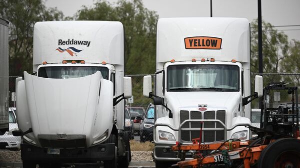 A truck sits in a Yellow Corp. facility lot, which closed after the freight trucking company ceased all operations, in Las Vegas, Nevada, on July 31, 2023. After receiving a loan from the federal government during the Covid-19 pandemic, Yellow is beginning to wind down all operations ahead of an expected bankruptcy filing. - Sputnik International