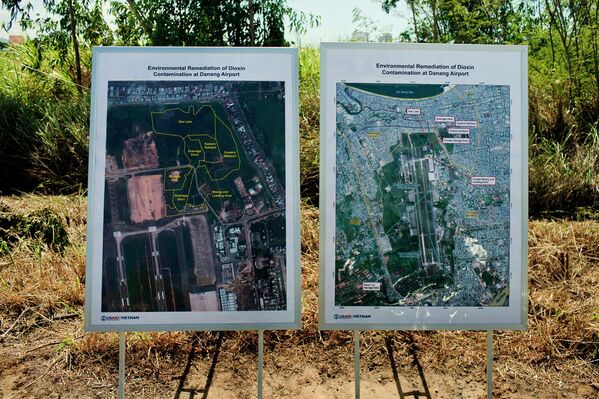 Maps of the area contaminated with dioxin around Danang airport are displayed during a ceremony marking the start of a project to clean up dioxin left over from the Vietnam War, at a former US military base in Danang, Vietnam.  - Sputnik International