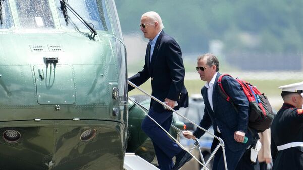 President Joe Biden boards Marine One with his son Hunter Biden as he leaves Andrews Air Force Base, Md., on his way to Camp David, Saturday, June 24, 2023 - Sputnik International