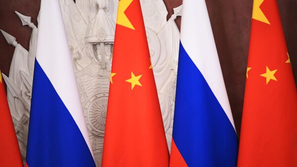March 21, 2023. Flags in the Malachite Hall of the Grand Kremlin Palace, where the signing ceremony of joint documents on deepening relations and areas of cooperation until 2030 between Russia and China will take place. - Sputnik International