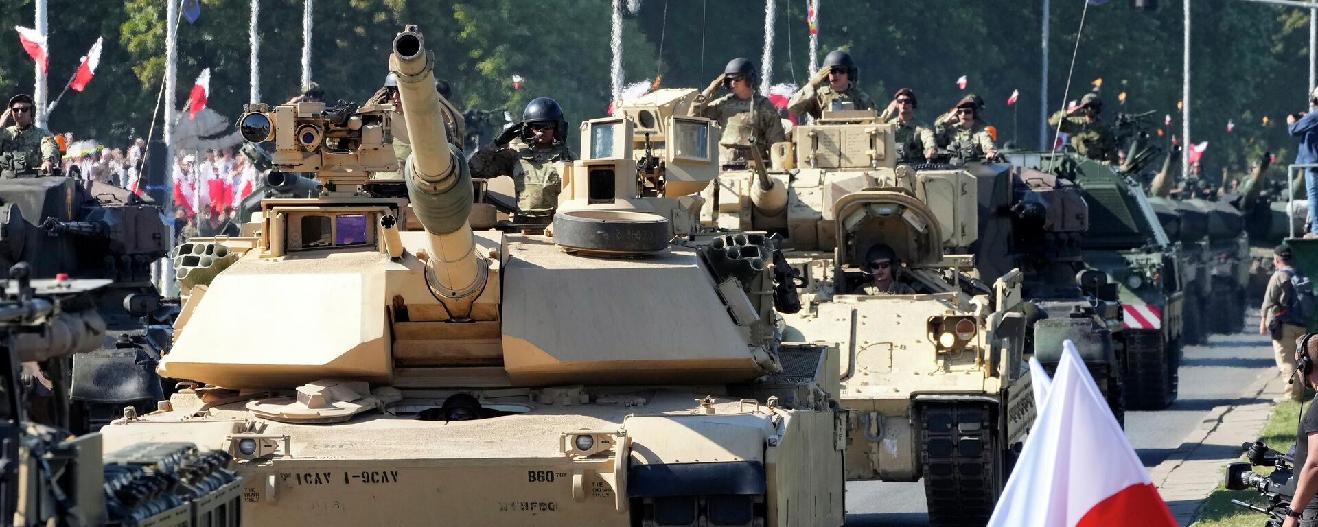 US-made Abrams tanks purchased by Poland take part in a massive military parade to celebrate the Polish Army Day in Warsaw. August 15, 2023. - Sputnik International, 1920, 15.08.2023