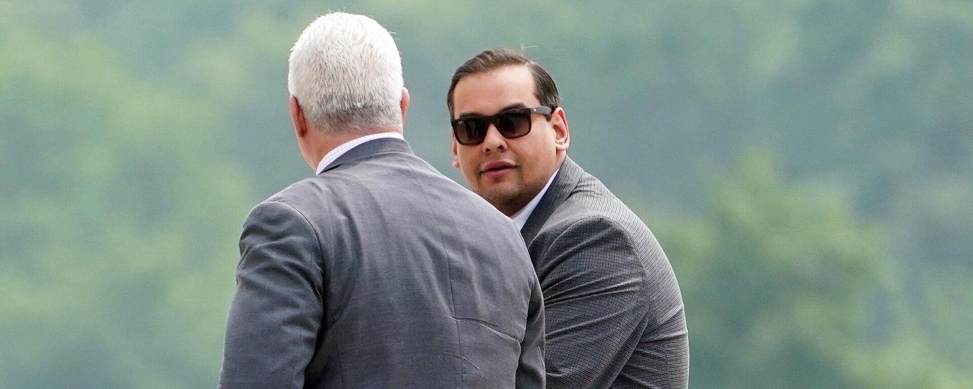 U.S. Rep. George Santos, right, R-N.Y., arrives to federal court alongside attorney Joseph Murray, Friday, June 30, 2023, in Central Islip, N.Y. Santos returned to court Friday for the first time since pleading not guilty last month to charges that he duped donors, stole from his campaign, collected fraudulent unemployment benefits and lied to Congress about being a millionaire. - Sputnik International, 1920, 17.08.2023