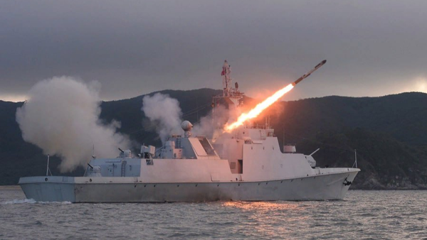 A North Korean patrol ship test-fires a cruise missile on August 21, 2023.  - Sputnik International