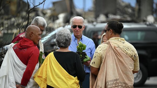 US President Joe Biden and First Lady Jill Biden participate in a blessing ceremony with the Lahaina elders at Moku'ula following wildfires in Lahaina, Hawaii on August 21, 2023. - Sputnik International