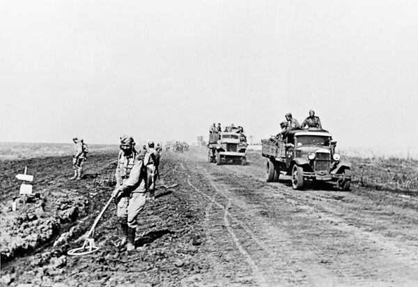 The advancing Nazi German forces marched straight into a network of minefields and anti-tank defenses, suffering heavy losses before the Red Army troops launched their counterattack.Above: Soviet combat engineers sweep the area for mines in the aftermath of the Battle of Kursk. - Sputnik International