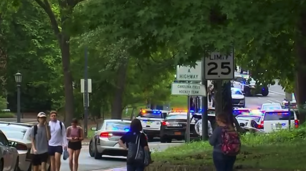 Authorities at the University of North Carolina - Chapel Hill temporarily placed the entire campus on lockdown Monday after police received reports of an armed gunman on the grounds and issued a shelter-in-place order for the surrounding areas. - Sputnik International