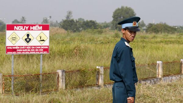 A Vietnamese soldier stands guard at the dioxin contaminated area while U.S. Defense Secretary Jim Mattis visits Bien Hoa air base in Bien Hoa, outside Ho Chi Minh City, Vietnam Wednesday, Oct. 17, 2018. File photo. - Sputnik International