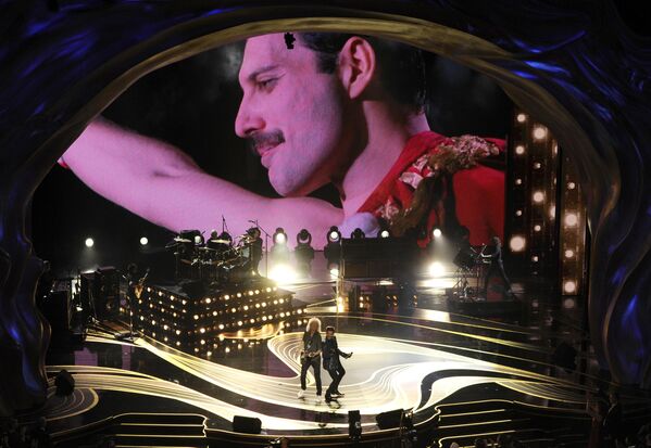 The hit &quot;Bohemian Rhapsody&quot; remained vague, since Mercury never explained its meaning, though he always used to say that it was about relationships. Pictured in the photo above: An image of Freddie Mercury appears on-screen as Brian May (L) and Adam Lambert perform at the Oscars on February 24, 2019, at the Dolby Theatre in Los Angeles.  - Sputnik International