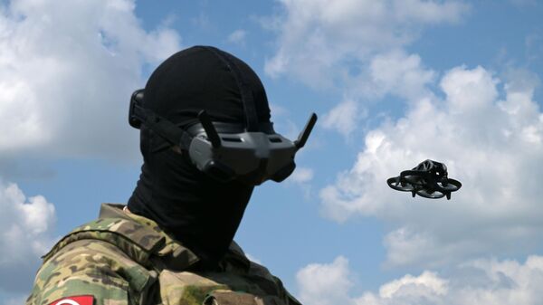 A Russian serviceman operates an UAV in the special operation zone in Ukraine. File photo - Sputnik International