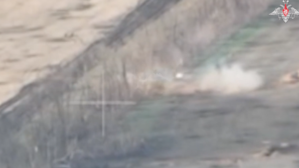A Ukrainian tank crew laucnhed an attack at Russian positions. Consequently, their vehicle was immediately destroyed by a pinpoint strike from a Russian anti-tank guided missile system unit - Sputnik International