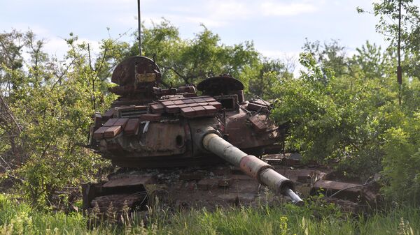 A destroyed tank of the Ukrainian Armed Forces in the Russian special operation zone in Ukraine. File photo - Sputnik International