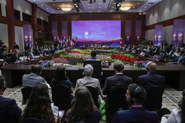Leaders and delegate members attend the Association of Southeast Asian Nations (ASEAN)-Canada Summit in Jakarta, Indonesia. - Sputnik International