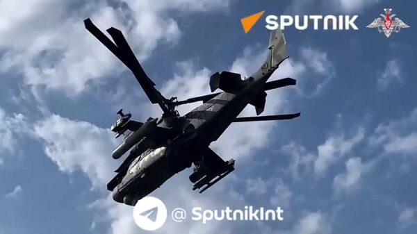 Russian Ka-52 attack helicopters crews in combat action - Sputnik International