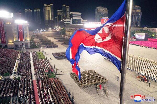 A solemn ceremony of raising the national flag of the DPRK took place, and columns of the Workers and Peasants&#x27; Red Militia also marched across the square. At the end of the parade, there was a fireworks display. - Sputnik International