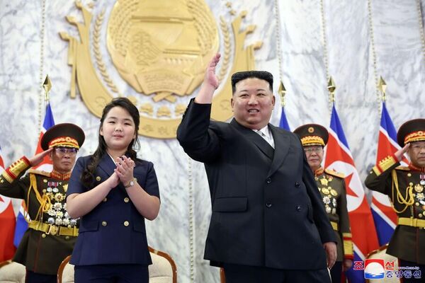 The North Korean leader was sent congratulatory messages timed to the occasion of Founding Day from Russia’s President Vladimir Putin, and the general secretary of the Chinese Communist Party, Xi Jinping, according to KCNA.Above: North Korean leader Kim Jong-un attends the parade with his daughter. - Sputnik International