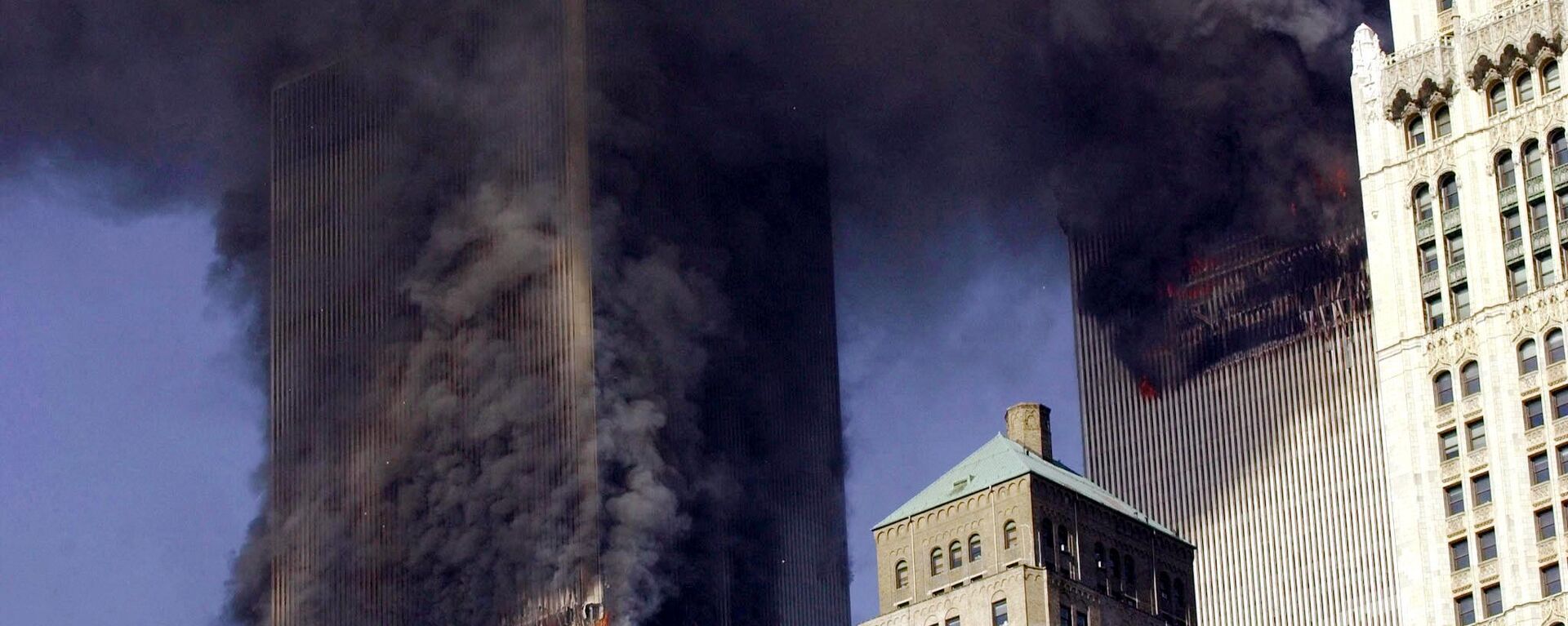  In this file photo smoke billows from the twin towers of the World Trade Center in lower Manhattan, New York on September 11, 2001.  - Sputnik International, 1920, 11.09.2023