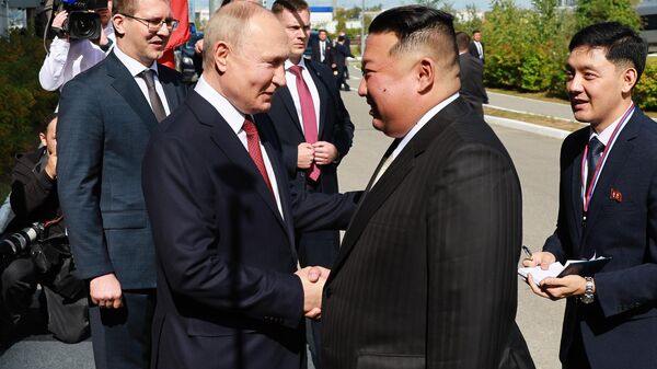 Vladimir Putin and Kim Jong Un at Vostochny Cosmodrome - Sputnik International