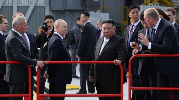  Russian President Vladimir Putin waits to greet North Korean leader Kim Jong Un during a visit to the Vostochny cosmodrome in Amur region, Russia. Mikhail Metzel / POOL - Sputnik International
