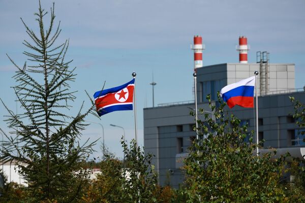 The flags of North Korea and Russia are flying on the premises of Vostochny Cosmodrome, September 13, 2023. - Sputnik International