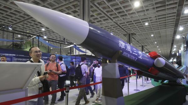 Visitors look at the Hsiung Feng III Super Sonic Anti-ship Missile during the Taipei Aerospace & Defense Technology Exhibition at the Nangang Exhibition Center in Taiwan, Thursday, Sept. 14, 2023. - Sputnik International