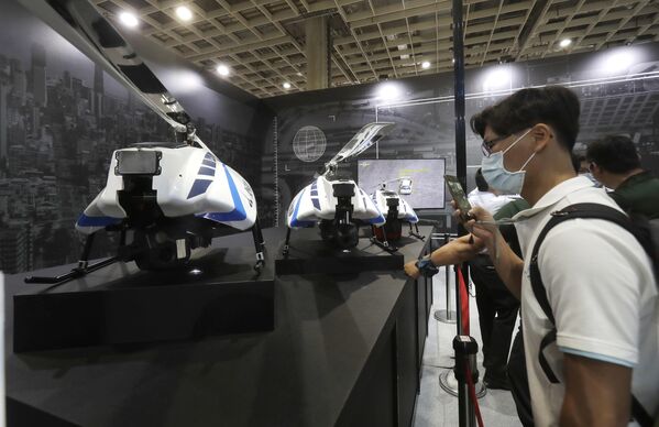 A visitor takes images of the Tactical Short Range drone at the TADTE, Taipei, Taiwan, September 14, 2023. - Sputnik International