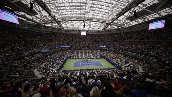 A fourth round match is played under the roof of Arthur Ashe Stadium during the U.S. Open tennis championships Monday, Sept. 2, 2019, in New York. Play at the 2023 U.S. Open begins at Flushing Meadows on Aug. 28, with Iga Swiatek and Carlos Alcaraz as the defending champions.  - Sputnik International
