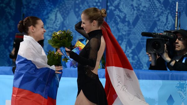Russian and Italian flags at Sochi Winter Olympics - Sputnik International