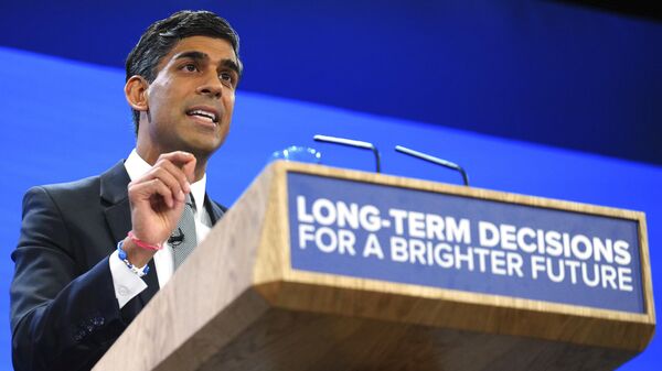 Britain's Prime Minister Rishi Sunak gestures as he speaks during the Conservative Party annual conference in Manchester - Sputnik International