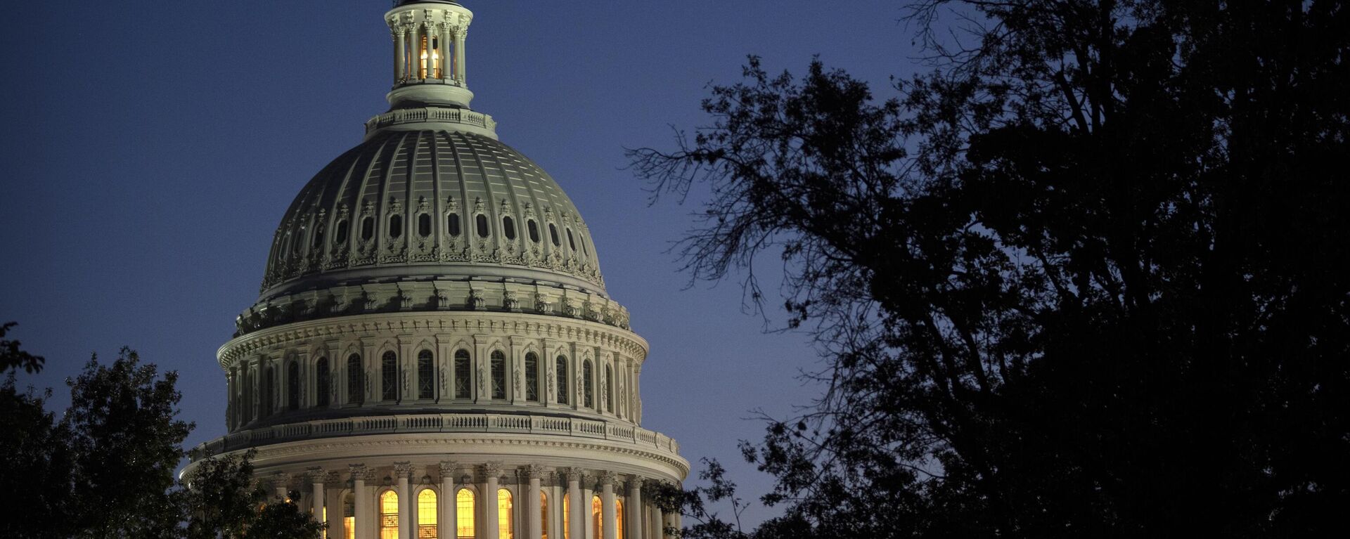 Night falls on the dome of the Capitol, hours after Rep. Kevin McCarthy, R-Calif., was ousted as Speaker of the House, Tuesday, Oct. 3, 2023 in Washington.  - Sputnik International, 1920, 21.11.2023
