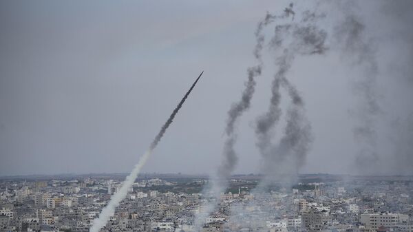 Rockets are launched by Palestinian militants from the Gaza Strip towards Israel, in Gaza, Saturday, Oct. 7, 2023.  - Sputnik International