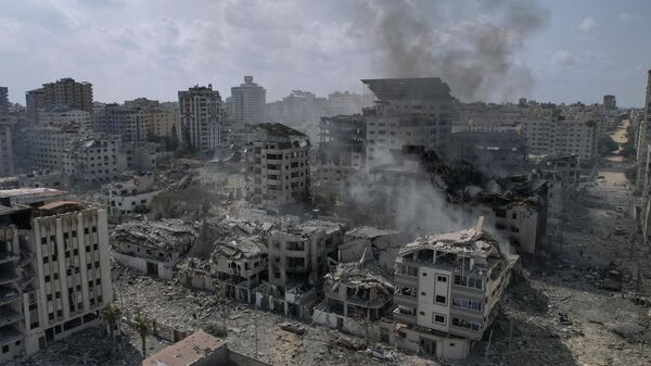 A view of the rubble of buildings hit by an Israeli airstrike, in Gaza City, - Sputnik International