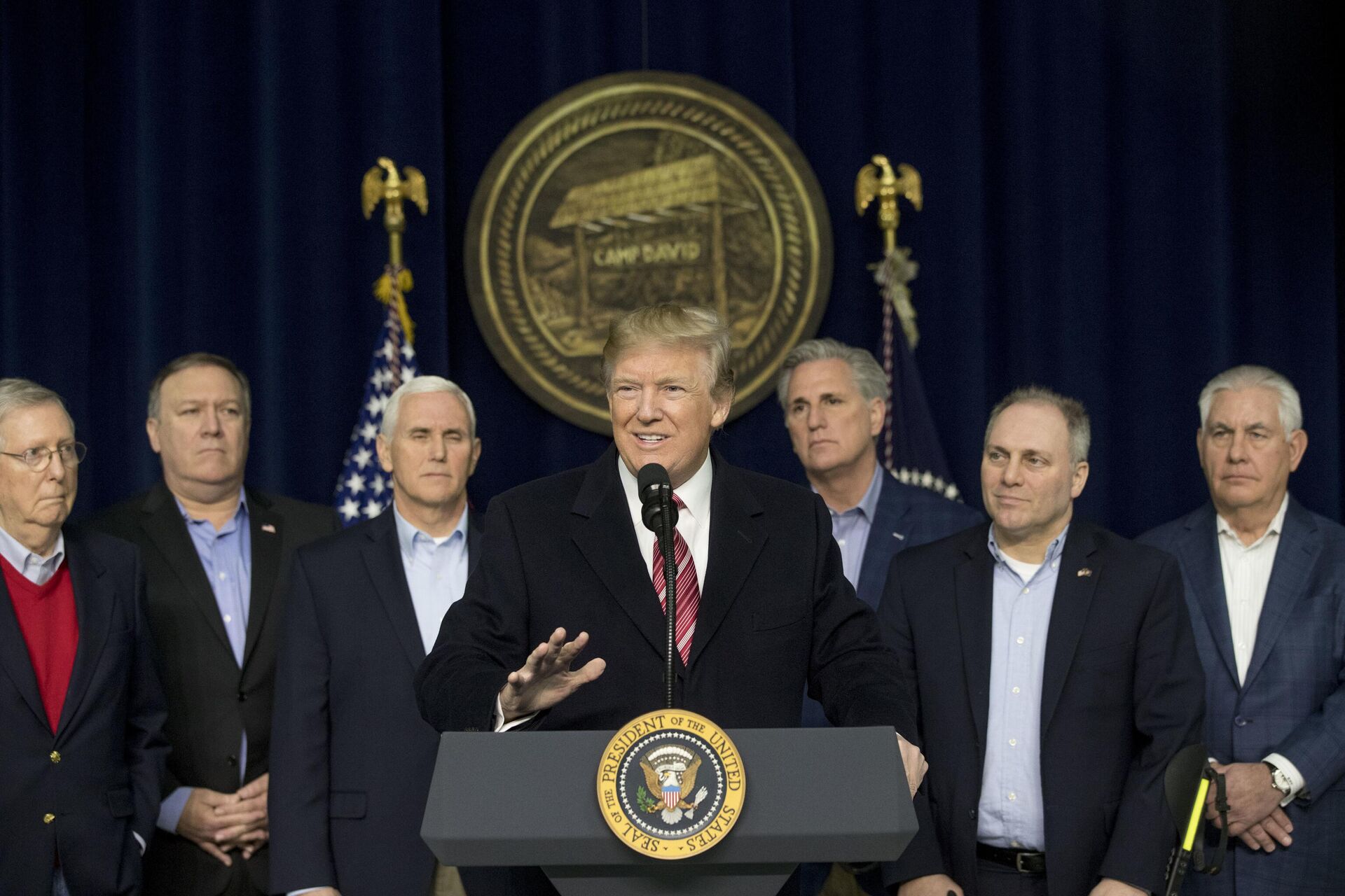 FILE - President Donald Trump, center, accompanied by from left, Senate Majority Leader Mitch McConnell of Ky., CIA Director Mike Pompeo, Vice President Mike Pence, House Majority Leader Kevin McCarthy of Calif., House Majority Whip Steve Scalise, R-La., Secretary of State Rex Tillerson, speaks after participating in a Congressional Republican Leadership Retreat at Camp David, Md., Jan. 6, 2018. - Sputnik International, 1920, 11.10.2023