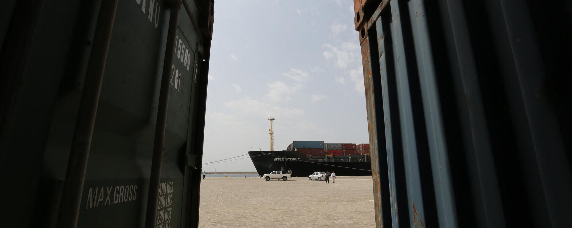 A photo taken on February 25, 2019 shows a cargo ship docked at the Shahid Beheshti Port in the southeastern Iranian coastal city of Chabahar, on the Gulf of Oman. - Sputnik International, 1920, 12.10.2023