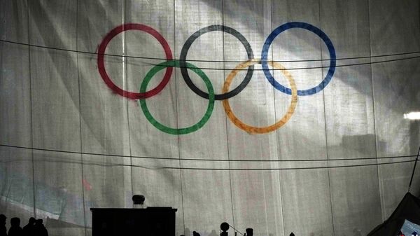 Olympic rings pictured on a banner - Sputnik International