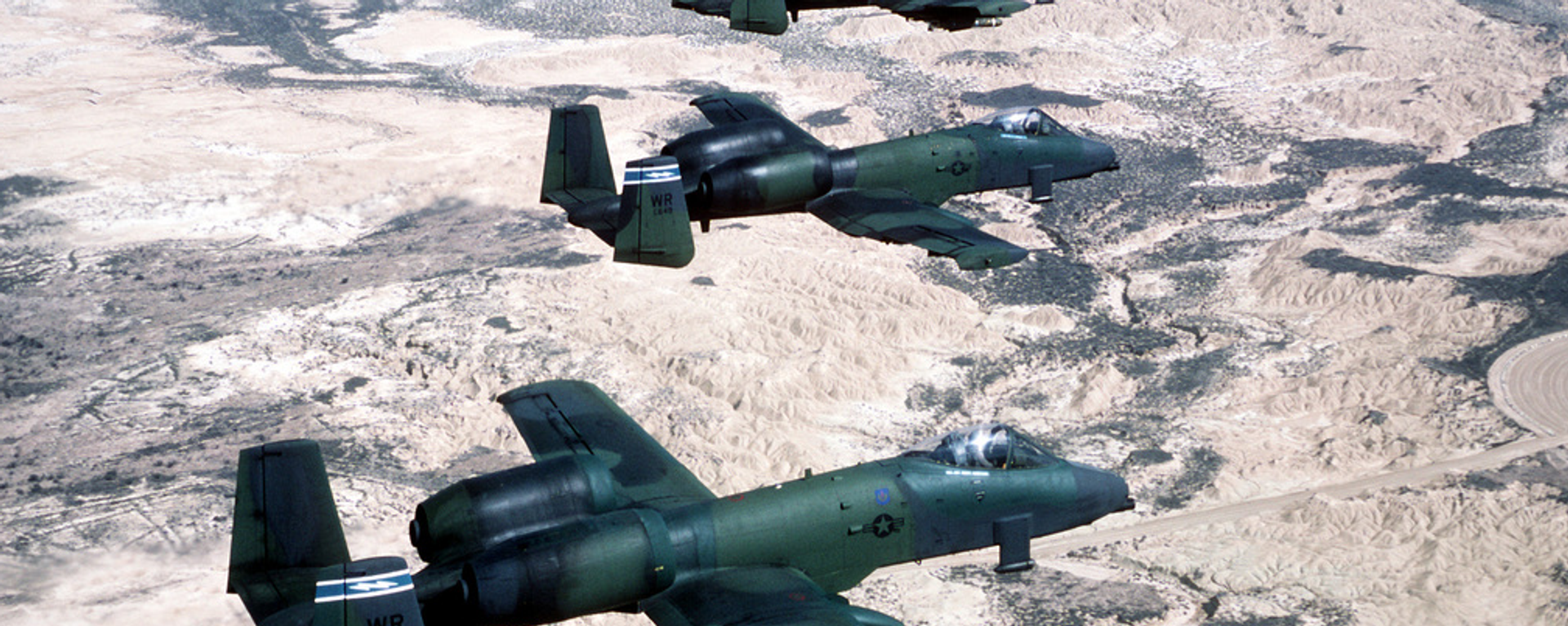 A-10A Thunderbolt II aircraft, capable of firing depleted uranium munitions, take part in drills. 1987. - Sputnik International, 1920, 20.12.2023