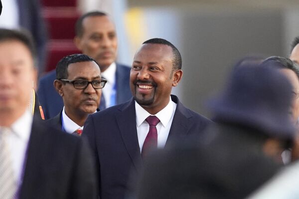 Ethiopian Prime Minister Abiy Ahmed arrives at Beijing Capital International Airport to attend the Belt and Road gathering scheduled for October 17-18. - Sputnik International