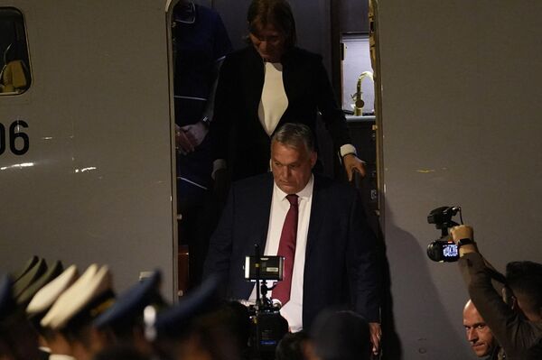 Hungarian Prime Minister Viktor Orban arrives at Beijing’s airport. - Sputnik International