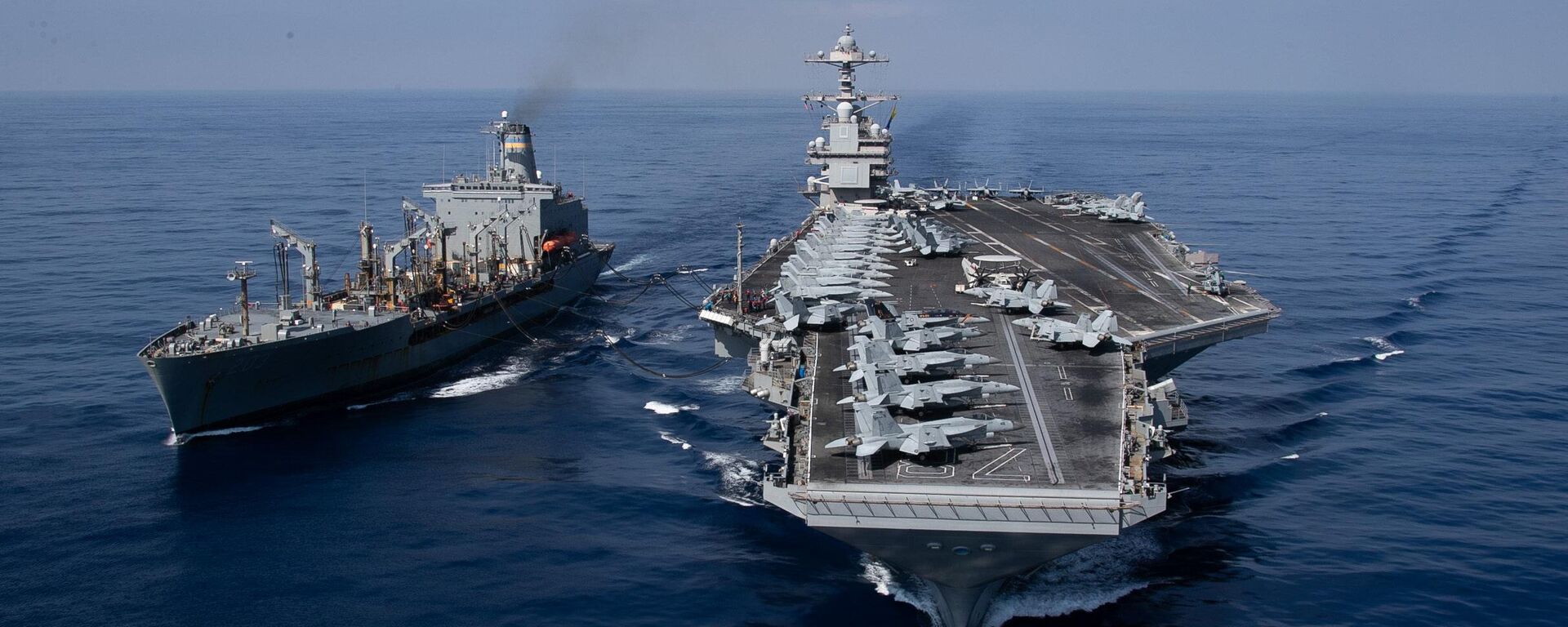 The world's largest aircraft carrier USS Gerald R. Ford (CVN) 78 and the USNS Laramie (T-AO-203) conduct a refueling-at-sea in the Eastern Mediterranean Sea, Oct. 11, 2023. - Sputnik International, 1920, 16.10.2023