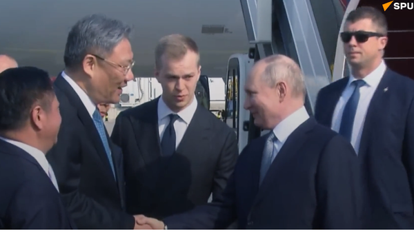 Vladimir Putin arrives in Beijing - Sputnik International