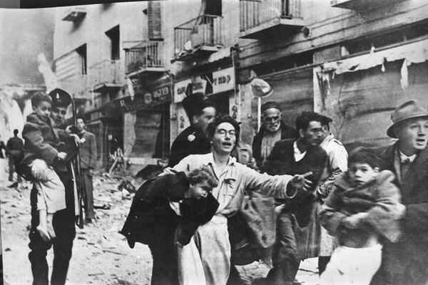 The picture dated 28 February 1947 shows the scene after a terror attack in Ben Yehuda Street in Jerusalem.The terror attack on Ben Yehuda Street in Jerusalem on February 28, 1947, was a significant event during the period of conflict between Jewish and Arab communities in British Mandate Palestine. The attack was carried out by a group of Jewish militants belonging to the Irgun, a Jewish paramilitary organization. The Irgun, led by Menachem Begin, was one of several groups involved in armed resistance against British colonial rule and Arab opposition. The target of the attack was the civilian population of Jerusalem, particularly those in the vicinity of Ben Yehuda Street, which was a popular commercial and entertainment area. The attack aimed to create chaos and disrupt daily life. The Irgun, along with other Jewish paramilitary groups, was advocating for the establishment of a Jewish state in Palestine. They believed that by targeting British forces and institutions, as well as Arab civilians, they could pressure the British to withdraw from Palestine and pave the way for Jewish statehood. The attack on Ben Yehuda Street was part of this broader campaign to achieve their political goals. The Irgun placed explosives in suitcases at several locations on Ben Yehuda Street. The explosives detonated in the evening, causing a devastating explosion that resulted in significant loss of life and widespread destruction. The explosion on Ben Yehuda Street resulted in the deaths of over 50 people, most of whom were civilians, and injured hundreds more. The attack caused extensive damage to buildings and businesses in the area, leaving a lasting impact on the city. The 1947 attack on Ben Yehuda Street occurred in the context of increasing violence between Jewish and Arab communities as well as against British authorities. It was part of a broader pattern of bombings, assassinations, and other acts of violence that characterized this period, which eventually led to the British decision to withdraw from Palestine in 1948. This withdrawal paved the way for the declaration of the State of Israel and the outbreak of the First Arab-Israeli War. - Sputnik International