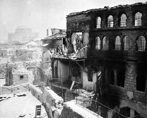 Ruins of a Jewish building in the old city of Jerusalem, Palestine, May 30, 1948, following the Arab Legion bombardment. Jewish troops surrendered themselves and the city to Transjordan Arab Legion troops on May 28.The battle for Jerusalem was a significant part of the wider conflict, the Arab-Israeli War of 1948. Jerusalem, with its historical and religious significance to Jews, Muslims, and Christians, became a focal point of the war. The city was divided, with Jewish and Arab neighborhoods, and both sides sought control of it.The Arab Legion, the army of the Hashemite Kingdom of Jordan, played a crucial role in the Arab forces&#x27; efforts to capture Jerusalem.The Arab Legion, originally known as the &quot;Arab Legion in Transjordan,&quot; was the military force of the Emirate of Transjordan, later known as the Hashemite Kingdom of Jordan. It was initially formed in the 1920s under the leadership of British officers.The Arab Legion was commanded by British officers, including General Sir John Bagot Glubb, commonly known as &quot;Glubb Pasha,&quot; who played a prominent role in its leadership.The Arab Legion was one of the more organized and effective Arab military forces during the 1948 war. It received training and support from the British and played a significant role in the capture of parts of Jerusalem and the West Bank.After the 1948 war, Jordan annexed the West Bank, including East Jerusalem, and the Arab Legion became the Jordanian Army. This annexation lasted until 1967 when Israel captured East Jerusalem and the West Bank during the Six-Day War. - Sputnik International