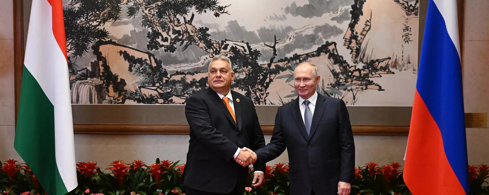 Hungarian Prime Minister Viktor Orban and Russian President Vladimir Putin shake hands before their meeting as part of the 3rd Belt and Road Forum at the Diaoyutai State Guest House in Beijing, China - Sputnik International, 1920, 05.07.2024