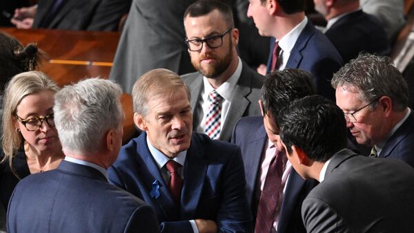 Rep. Jim Jordan (R-OH) talks to fellow lawmakers as the House of Representatives holds a vote on a new Speaker of the House at the US Capitol on October 18, 2023 in Washington, DC - Sputnik International