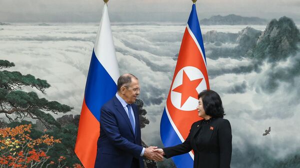Russian Foreign Minister Sergei Lavrov and his North Korean counterpart Coe Son-hui during Lavrov's two-day visit to Pyongyang, October 19, 2023. - Sputnik International